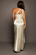 Champagne satin with bustier top and ruching along with a high slit