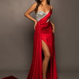 Red satin column shaped dress with one shoulder strap and high slit