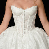 lace ballgown wedding dress featuring dramatic hips, corsetry, and timeless royal elegance for hire