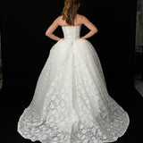lace ballgown wedding dress featuring dramatic hips, corsetry, and timeless royal elegance for hire