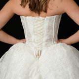 lace ballgown wedding dress featuring dramatic hips, corsetry, and timeless royal elegance for hire