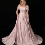 baby pink ballgown with elegant draping and a timeless silhouette.