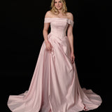 baby pink ballgown with elegant draping and a timeless silhouette.