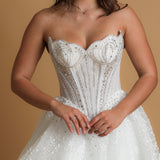 White sparkling scallop neckline with basque waist dress