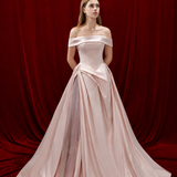 baby pink ballgown with elegant draping and a timeless silhouette.