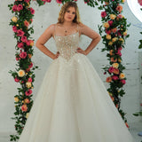 Light champagne wedding ballgown featuring a straight neckline, delicate beaded straps, sheer sparkling bodice, basque waistline, and corset back for hire