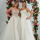two-piece gown with beaded corset, satin skirt, and sweetheart neckline