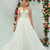 white lace ballgown featuring a strapless sweetheart neckline, basque waistline, corset back, and voluminous crinoline skirt