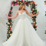 white lace ballgown featuring a strapless sweetheart neckline, basque waistline, corset back, and voluminous crinoline skirt