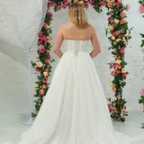 white lace ballgown featuring a strapless sweetheart neckline, basque waistline, corset back, and voluminous crinoline skirt for hire