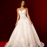 ball gown featuring a champagne skirt, drop waist and plunging V-neckline. Structured corset back and flowing skirt for hire