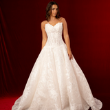 ball gown featuring a champagne skirt, drop waist and plunging V-neckline. Structured corset back and flowing skirt for hire