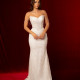 strapless wedding dress with sweetheart cup, structured corset back, and beaded fabric, fitted mermaid design for hire