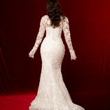 Long sleeved wedding mermaid dress with corset top and lace up back and buttons back