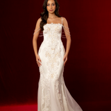 elegant mermaid gown with corset back, beaded off-shoulder details, lace and satin fabric, subtle straps, and a detachable train for hire