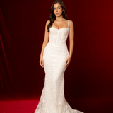mermaid-shaped gown with delicate straps, sculpted cups, corset back, and intricate beaded lace fabric