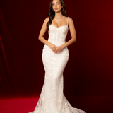 mermaid-shaped gown with delicate straps, sculpted cups, corset back, and intricate beaded lace fabric