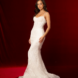 mermaid-shaped gown with delicate straps, sculpted cups, corset back, and intricate beaded lace fabric