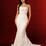 strapless mermaid gown with lace florals, exposed boning, and a romantic sculpted silhouette