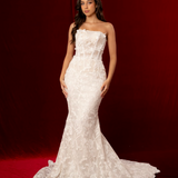 strapless mermaid gown with lace florals, exposed boning, and a romantic sculpted silhouette