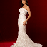 strapless mermaid gown with lace florals, exposed boning, and a romantic sculpted silhouette