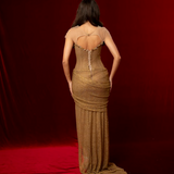 long mermaid gown with a boned corset, mesh sleeves, sequins, beads, crystals, and ruched fabric for hire