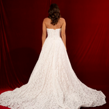 strapless A-line gown with deep V neckline, lace detailing, and a dramatic train fore hire