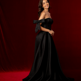 long black A-line gown with satin draping and a sculpted corset bodice for hire