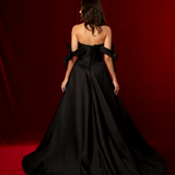 long black A-line gown with satin draping and a sculpted corset bodice for hire