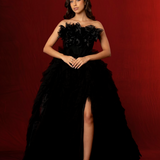 sleeveless black ball gown with a boned corset, sweetheart neckline, and layered tulle skirt for hire
