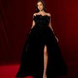 sleeveless black ball gown with a boned corset, sweetheart neckline, and layered tulle skirt for hire