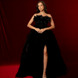 sleeveless black ball gown with a boned corset, sweetheart neckline, and layered tulle skirt for hire