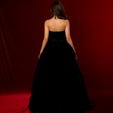 sleeveless black ball gown with a boned corset, sweetheart neckline, and layered tulle skirt for hire