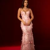 Baby pink mermaid gown with plunging V neckline, exposed corset boning, and silver glitter floral appliqué.