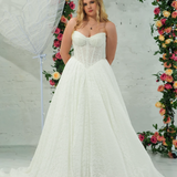 white lace ballgown featuring a strapless sweetheart neckline, basque waistline, corset back, and voluminous crinoline skirt