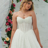 white lace ballgown featuring a strapless sweetheart neckline, basque waistline, corset back, and voluminous crinoline skirt