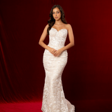white strapless mermaid wedding dress with sweetheart neckline, exposed boning, corset back, and lace sequin detailing