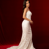 white strapless mermaid wedding dress with sweetheart neckline, exposed boning, corset back, and lace sequin detailing