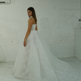 ballgown wedding dress featuring sparkling lace, dramatic hips, and an elegant neck cuff for hire