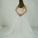 ballgown wedding dress featuring sparkling lace, dramatic hips, and an elegant neck cuff for hire