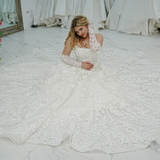 romantic white ballgown adorned with floral lace and enchanting 3D floral details for hire