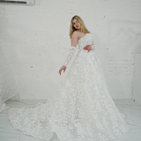 romantic white ballgown adorned with floral lace and enchanting 3D floral details for hire