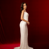 Ivory white beaded dress with basque waist and open back for hire