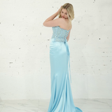 Dazzling baby blue mermaid gown featuring a beaded corset bodice, thigh-high slit, and elegant train.