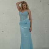 Dazzling baby blue mermaid gown featuring a beaded corset bodice, thigh-high slit, and elegant train.