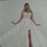 A-line wedding dress featuring 3D florals, sparkling lace, and a modern slit for hire