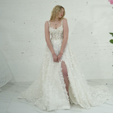 A-line wedding dress featuring 3D florals, sparkling lace, and a modern slit for hire