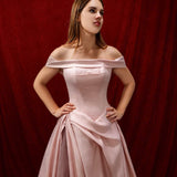 baby pink ballgown with elegant draping and a timeless silhouette.