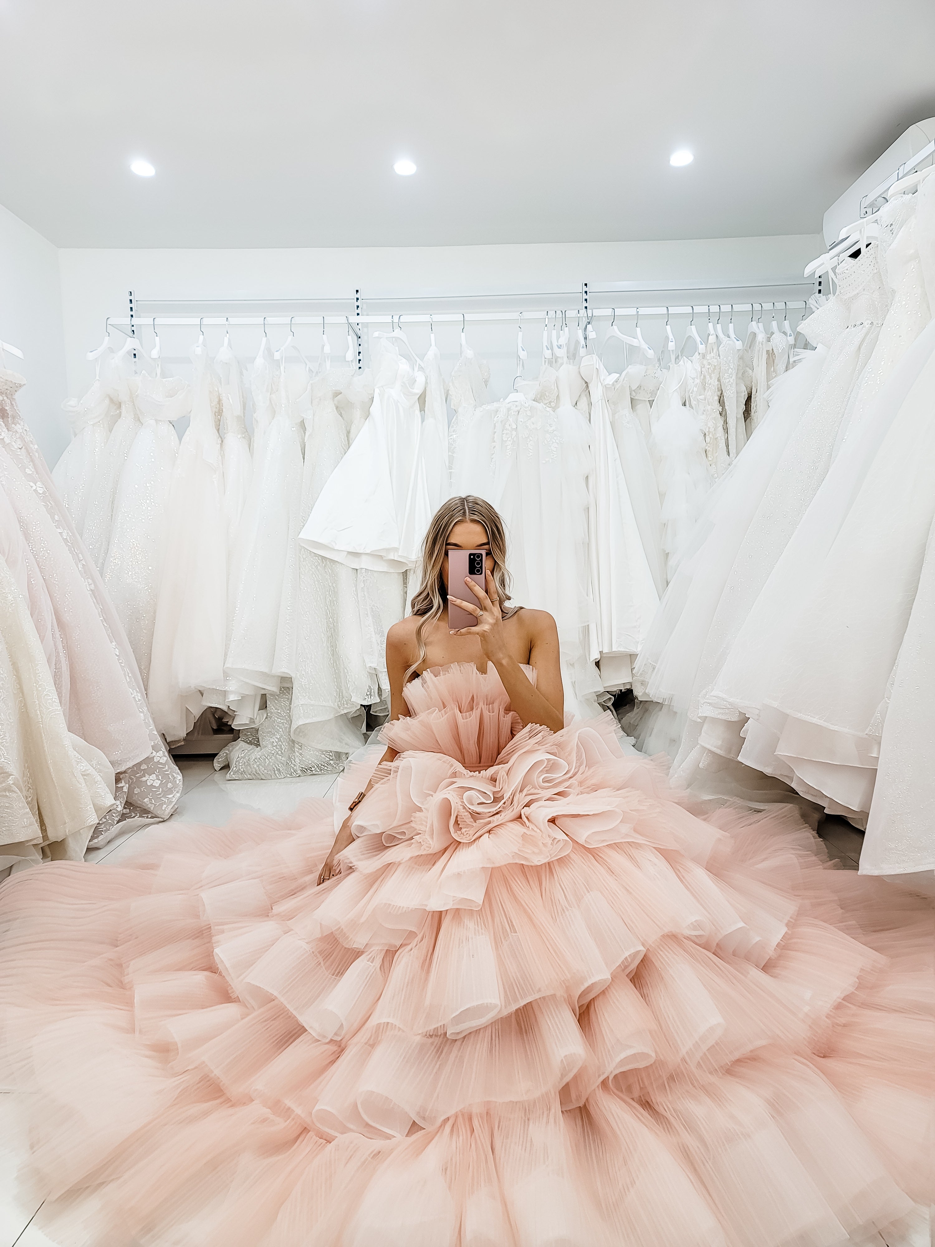 Nudish pink with a bushier top and a bushier puffy layered skirt