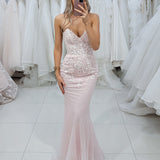 Sparkling pink dress with strapless deep V neckline and corset back